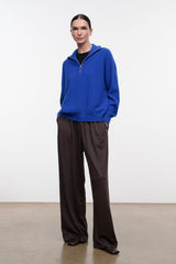 Dark oak wide-leg pants with elastic waistband and loose drape, full length