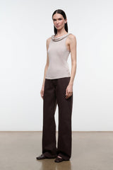 Front view of women's champagne sleeveless cowl-neck fitted top with thin straps