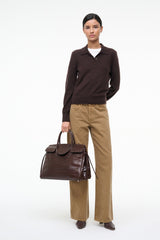 Dark chocolate cashmere polo sweater with button placket and long sleeves