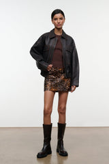 Crest haircalf mini skirt with fawn brown base and dark speckled finish