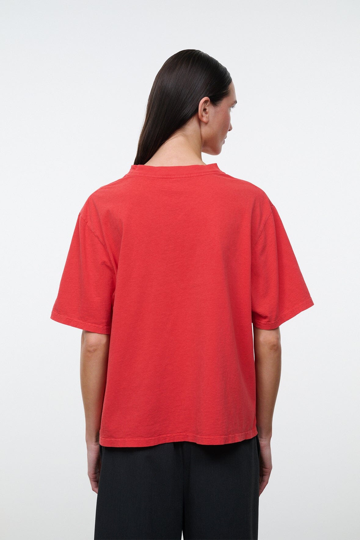 Relaxed red T-shirt with crew neck and short sleeves, shown from the back