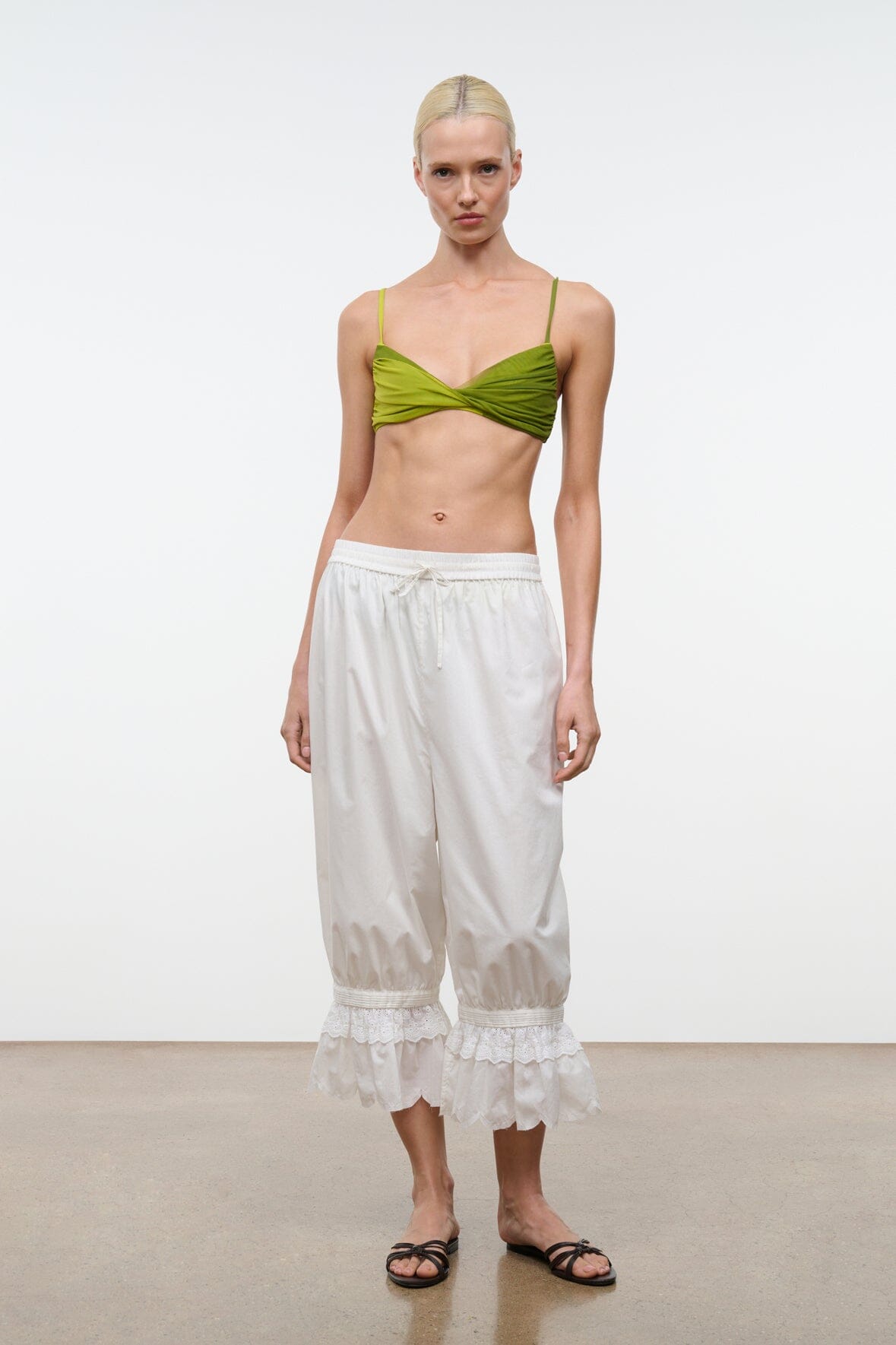 LA MER bikini top in citron pesto green with twist-front cups and thin adjustable straps
