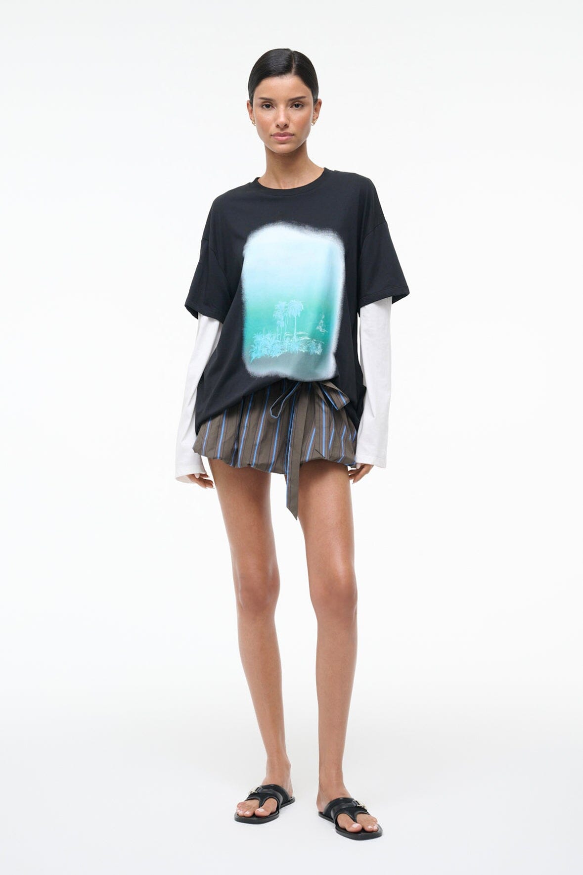 Pleated striped skirt with drawstring waist, vertical blue and gray stripes above knee