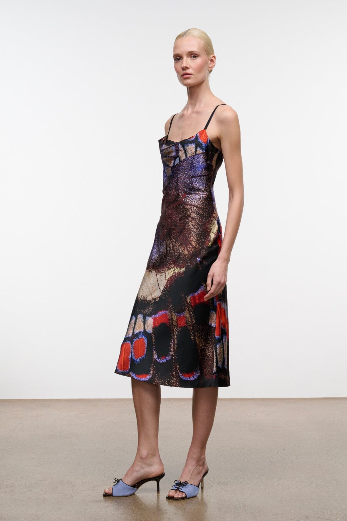 Silk midi dress with thin straps, butterfly print skirt with colorful motifs