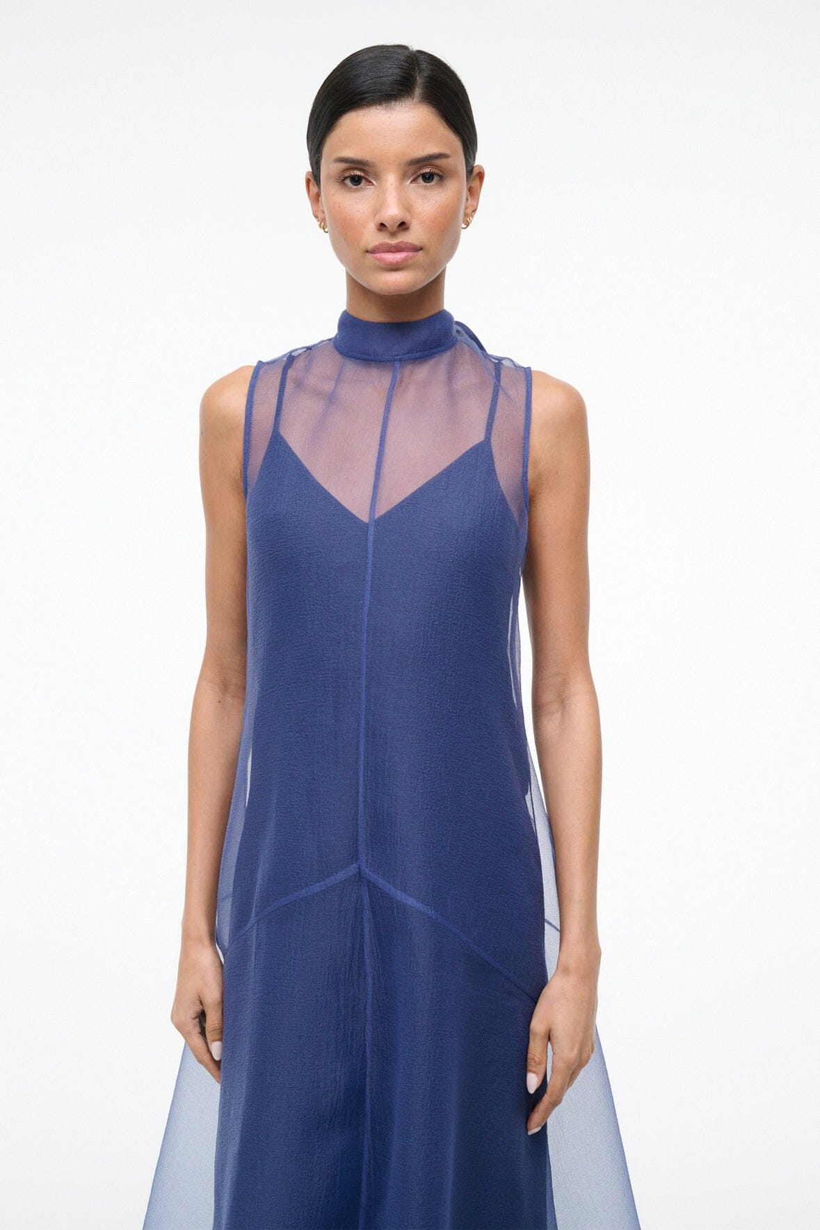 Navy sleeveless high-neck dress with V-back and layered sheer overlay