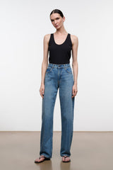 High-rise blue denim jeans with wide straight leg and contrast stitching.