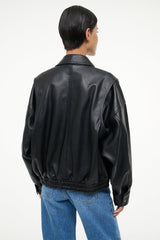 Back view of black leather bomber jacket with ribbed hem and zippered sleeves