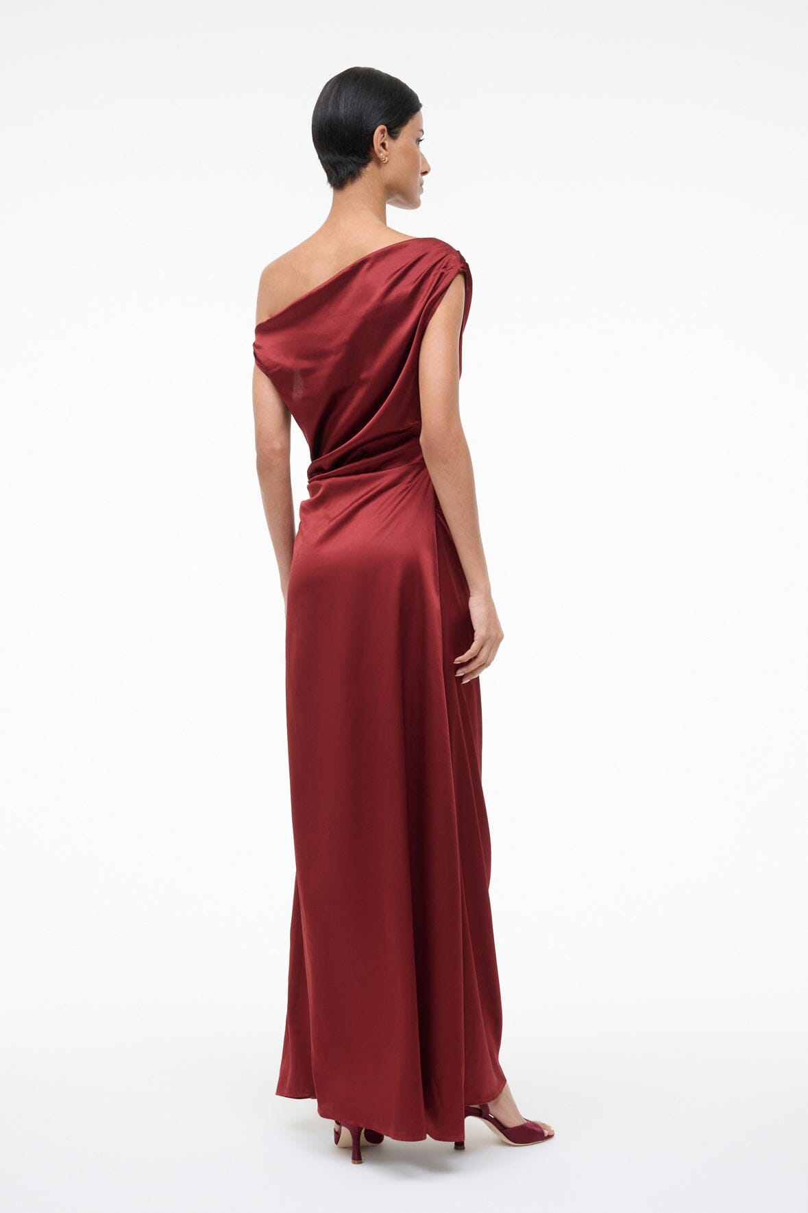 Burgundy silk maxi dress with one-shoulder drape, side ruching, ankle-length skirt