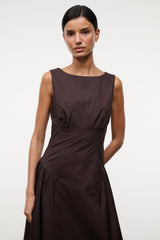 Brown sleeveless midi dress close-up, ruched waist and gathered skirt detail.
