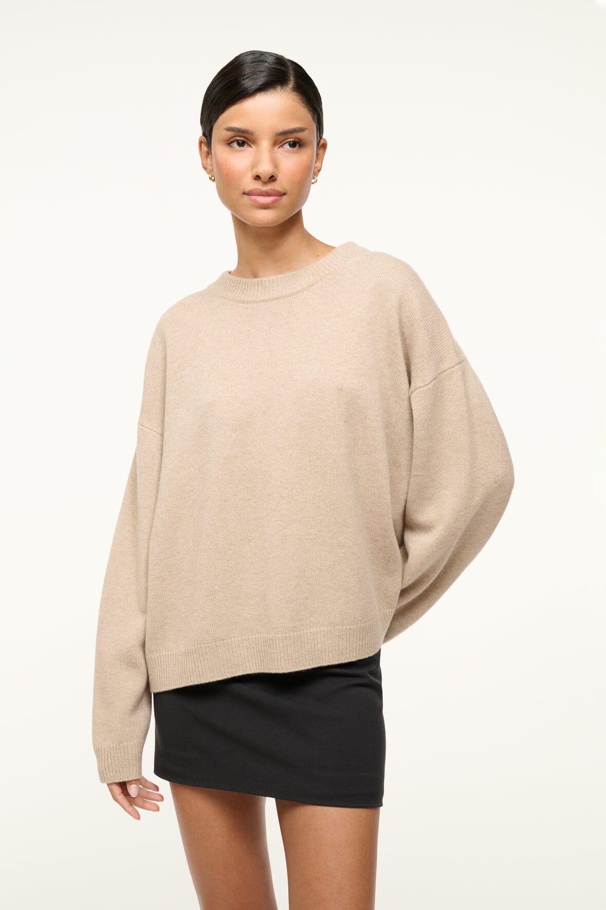 Stone relaxed cashmere crewneck sweater with dropped shoulders and ribbed hem