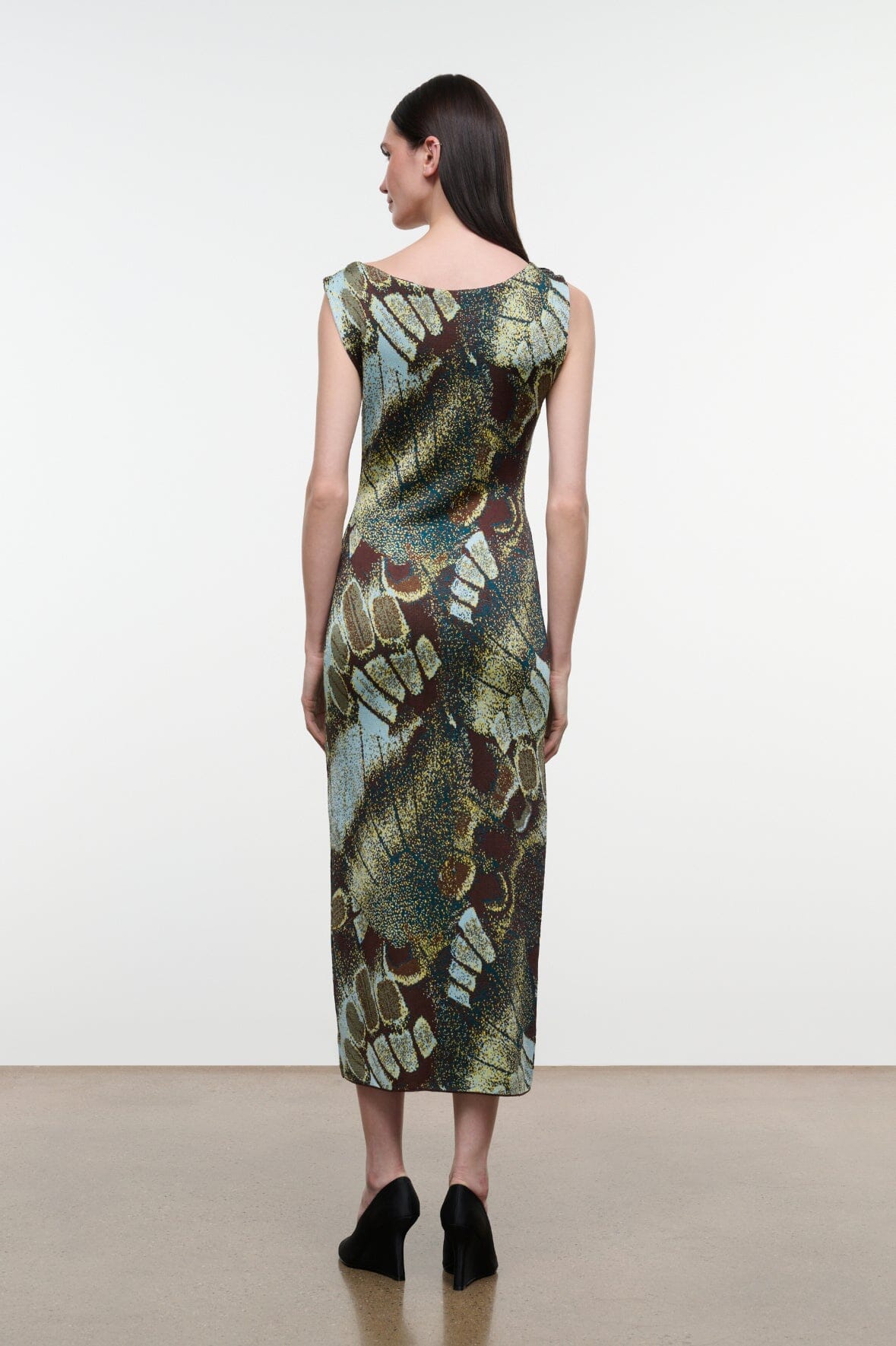 Back view sleeveless midi sheath dress with green-and-brown butterfly-moss print