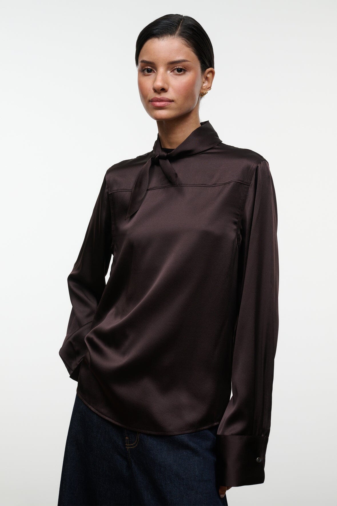 Front view earth-brown silk top with stand collar, long sleeves, button placket