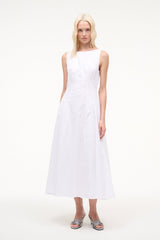 White sleeveless midi dress with scoop neckline and nipped waist flare