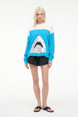 Crewneck sweater with blue-and-white shark graphic, ribbed cuffs and hem