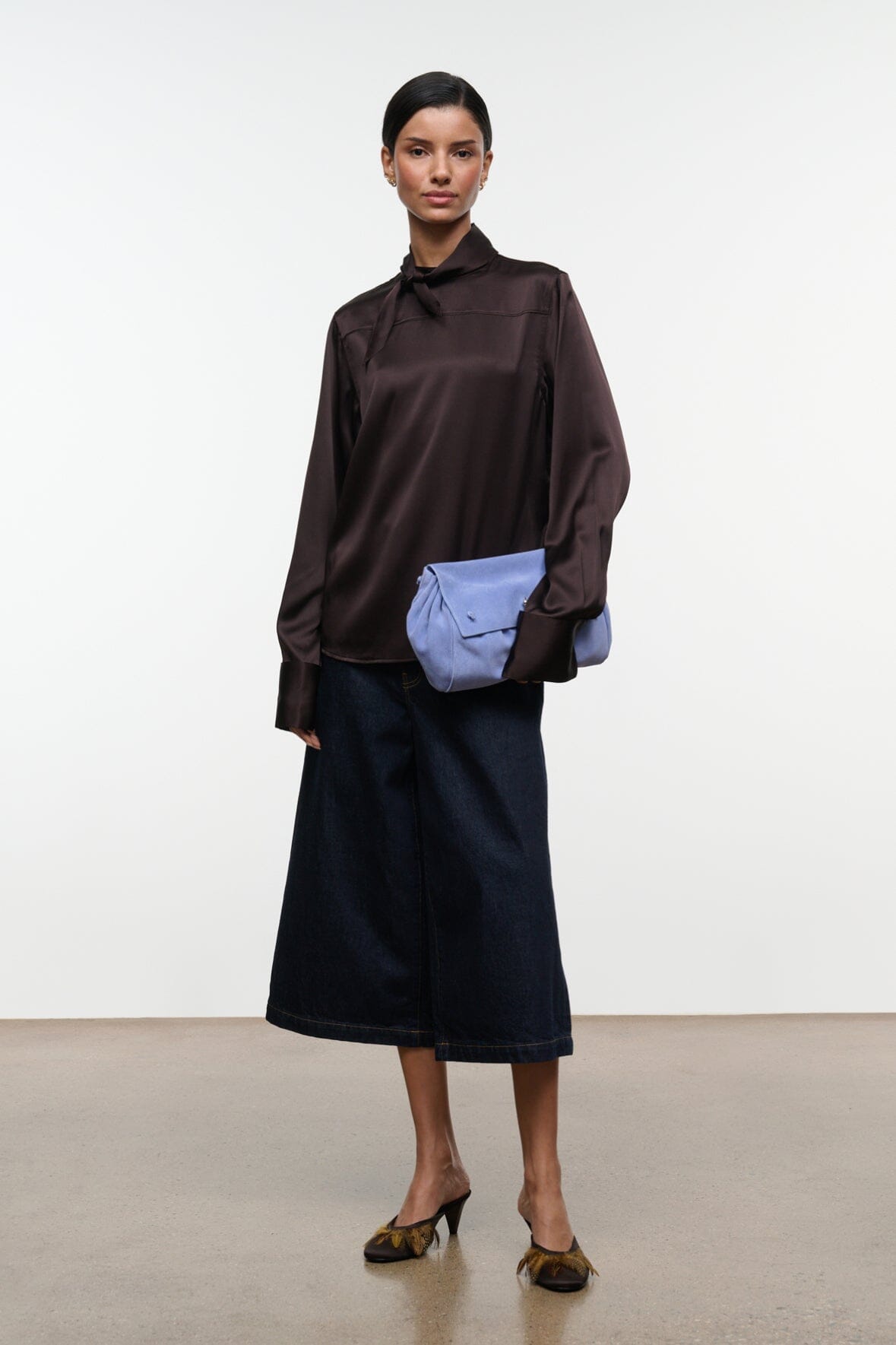 Earth-brown silk top with stand collar and button front, long sleeves