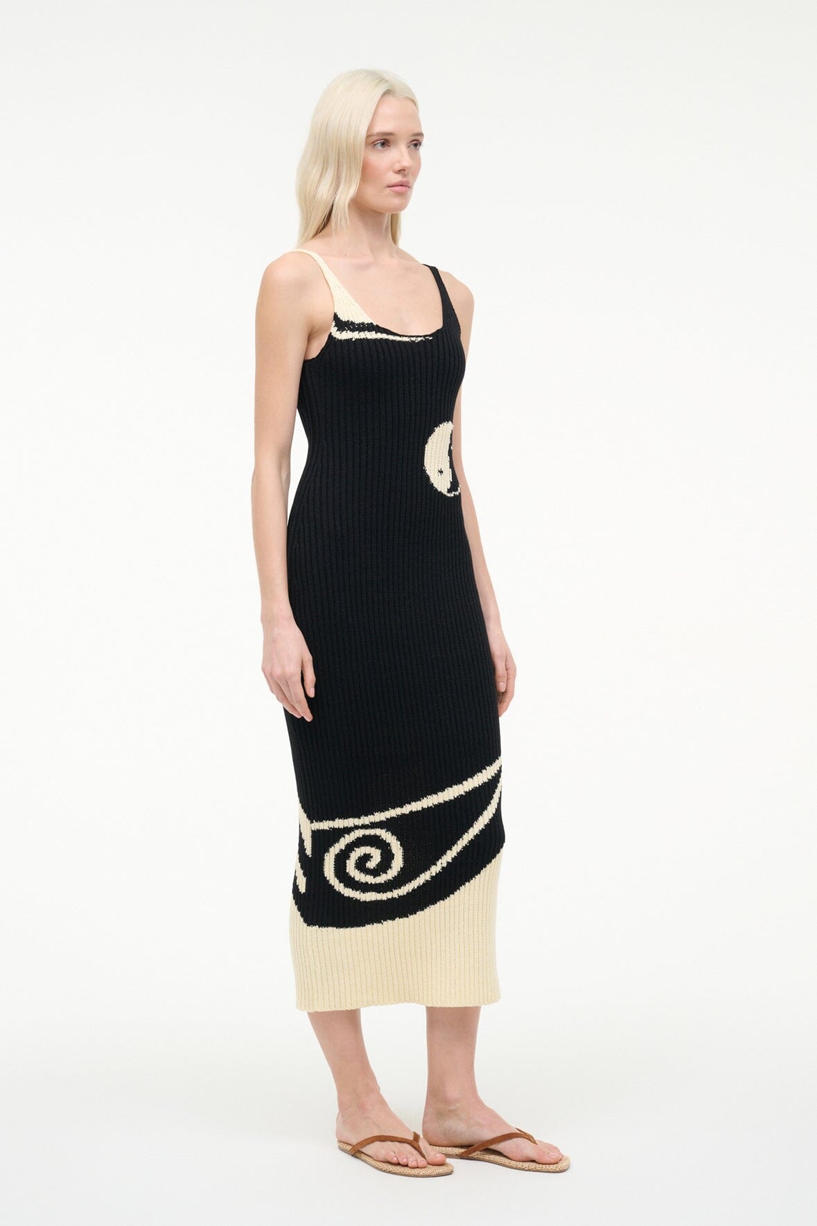 Black ribbed midi dress with spaghetti straps and ivory yin-yang print along the side