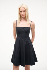 Black mini dress with square neckline, spaghetti straps and flared skirt