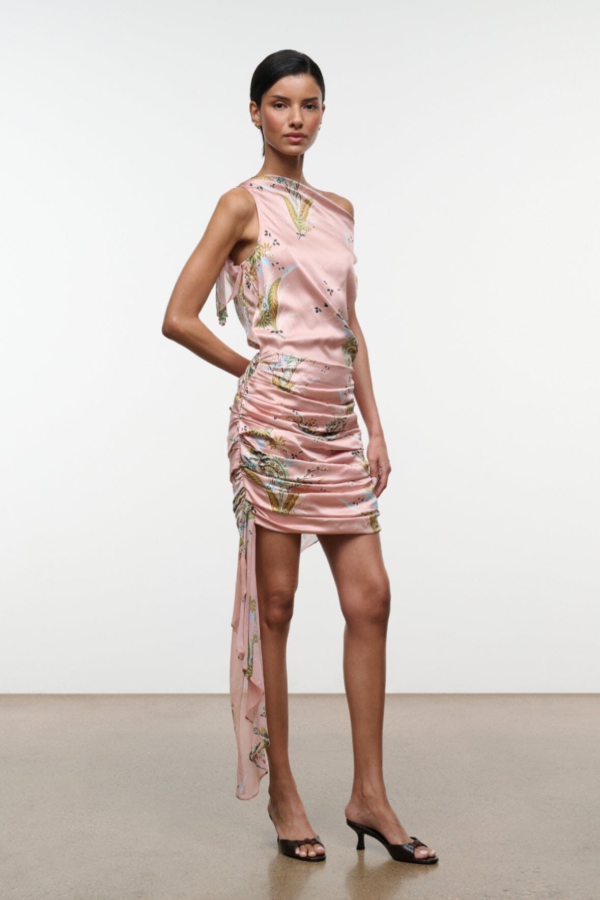 Pink silk dress with tapestry floral print, fitted ruched bodice and mini hem, draped detail