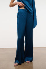 Blue silk wide-leg pant showing full front with relaxed flared legs