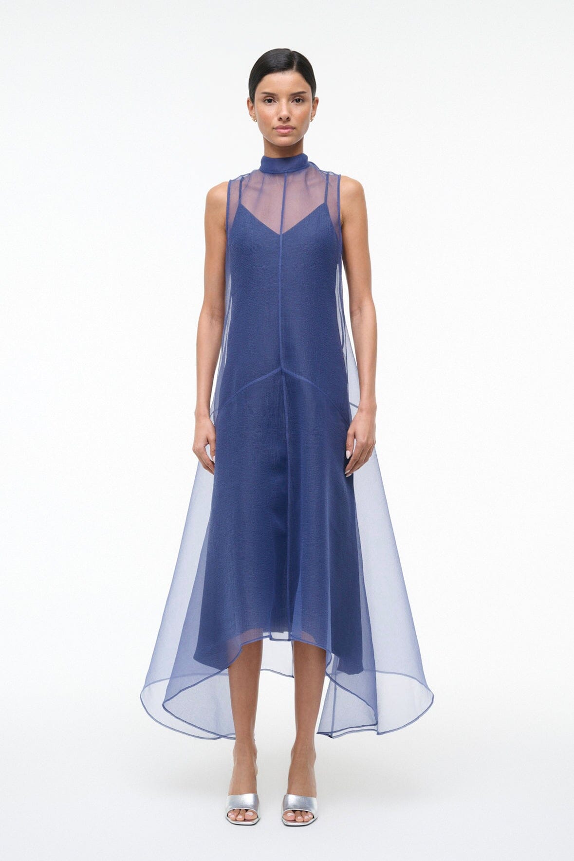 Navy sleeveless high-neck dress with layered sheer skirt hem