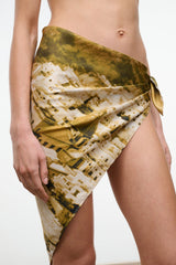Silk scarf, olive-and-gold abstract print, asymmetrical wrap tied at side