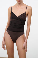 Dark brown ruched one-piece swimsuit with spaghetti straps and crossover neckline