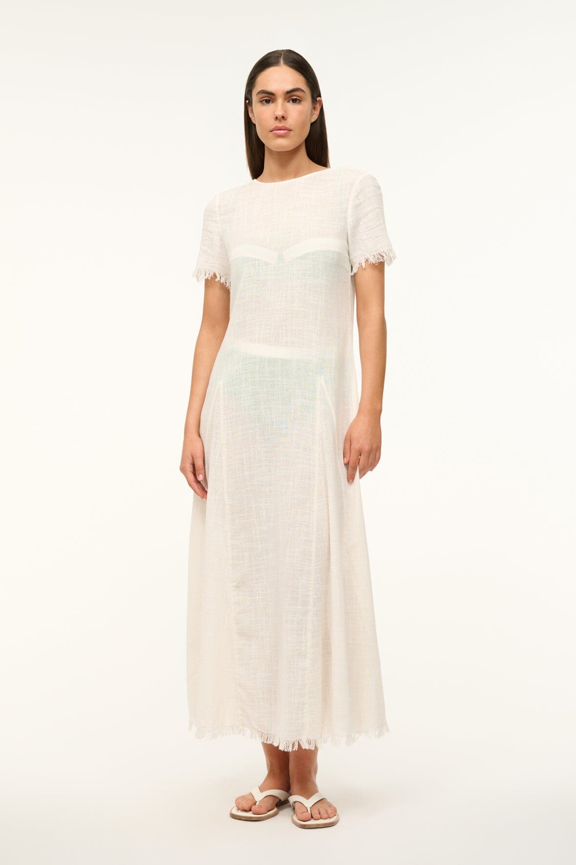 Coverup dress in buttercream with short frayed sleeves and straight midi silhouette