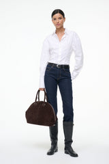 White button-up top with long sleeves and pointed collar