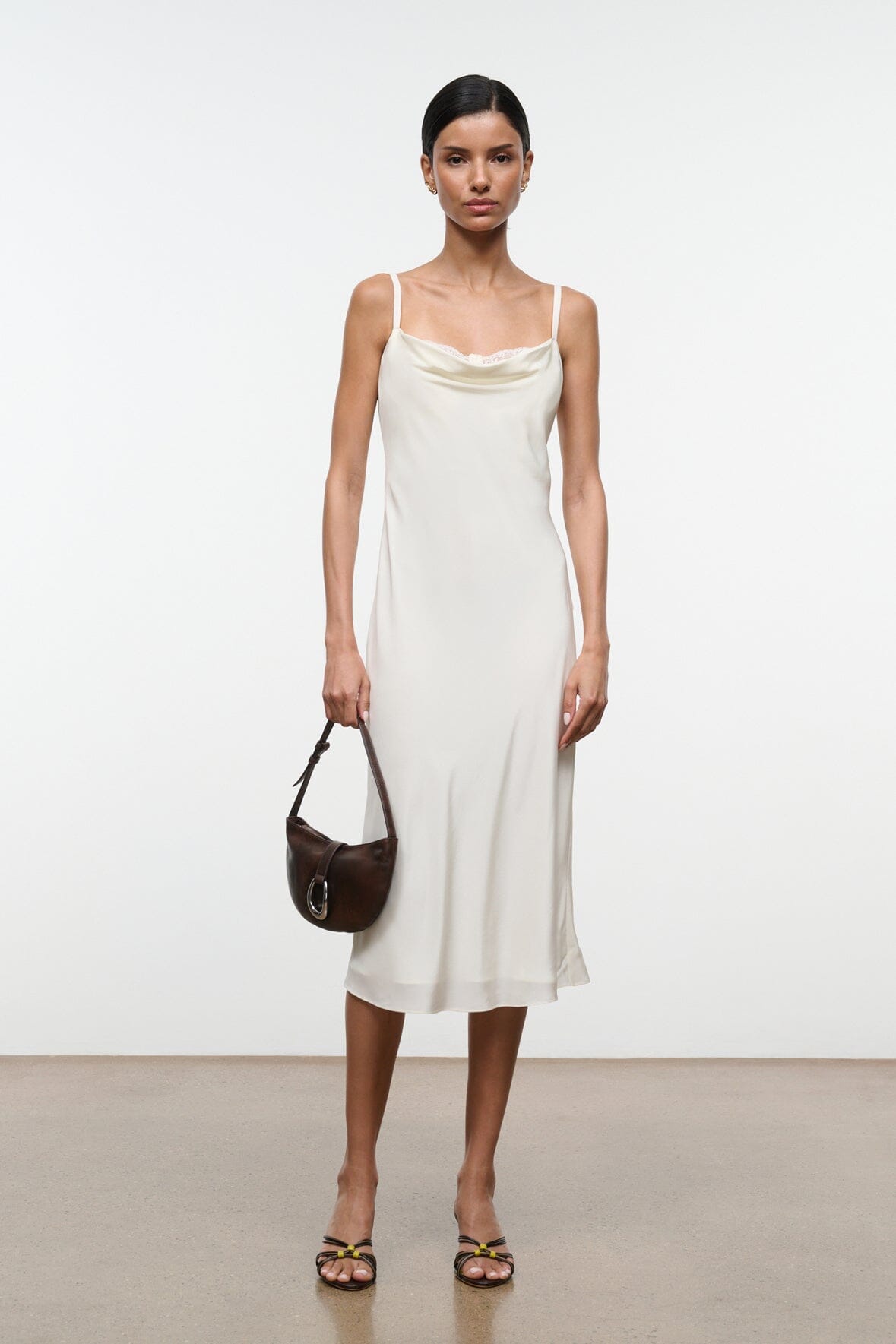 Ivory silk midi slip dress with lace-trim scoop neckline and spaghetti straps