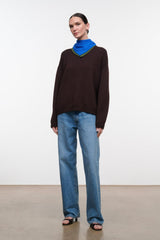Brown knit sweater with blue-green cowl neck, relaxed fit