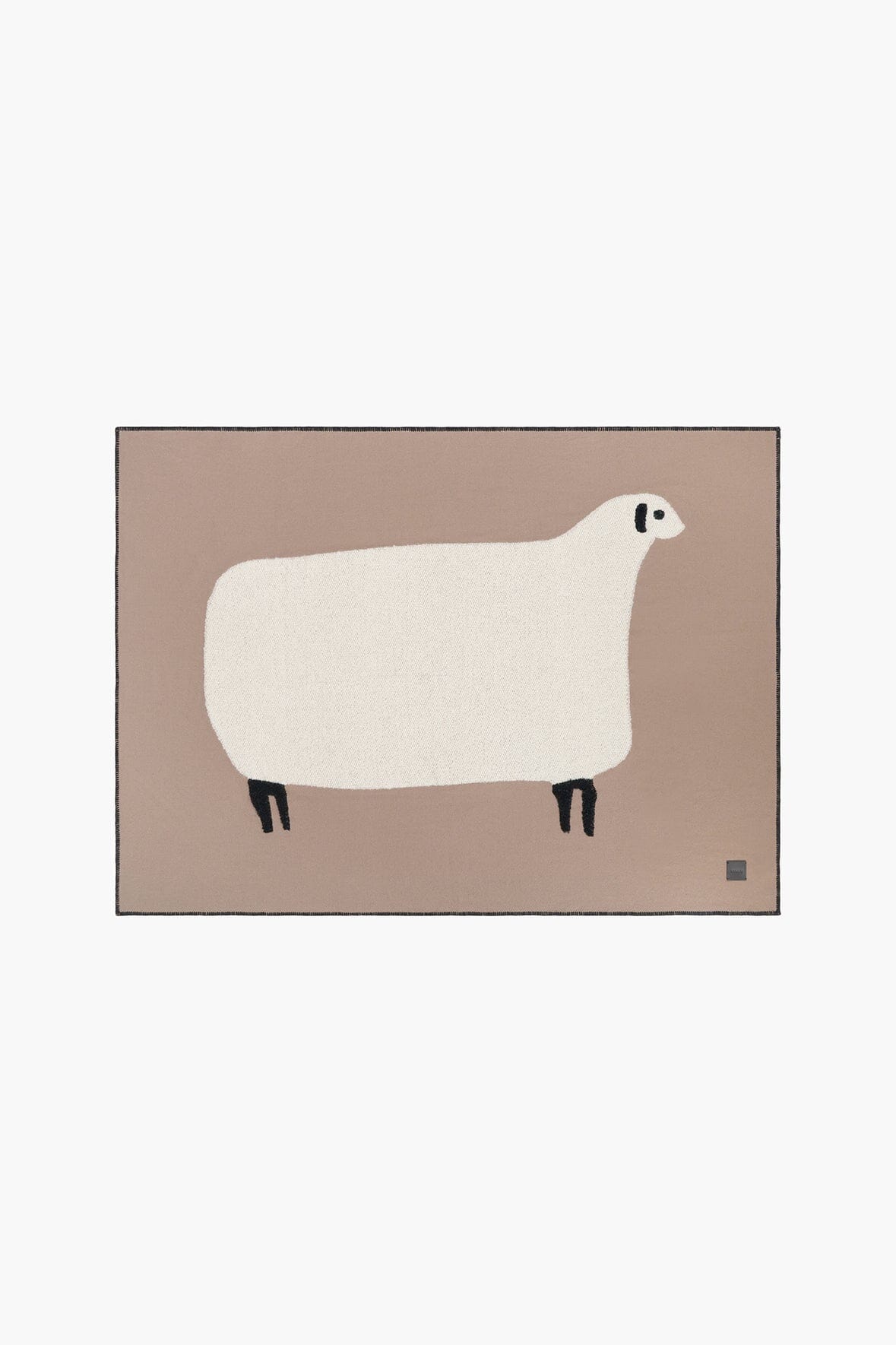 Sheep motif throw blanket in truffle taupe with cream sheep design