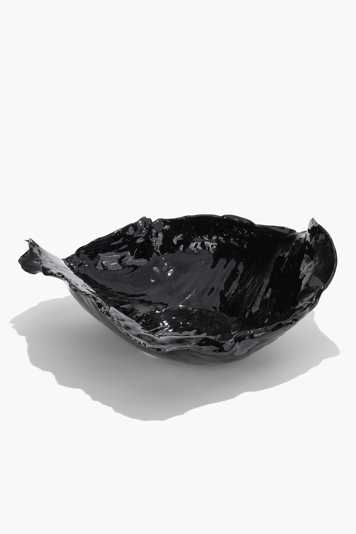 Black glazed wavy ceramic bowl, glossy irregular rim