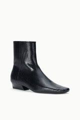 Black snake-embossed flat ankle boot, angled side view, low block heel
