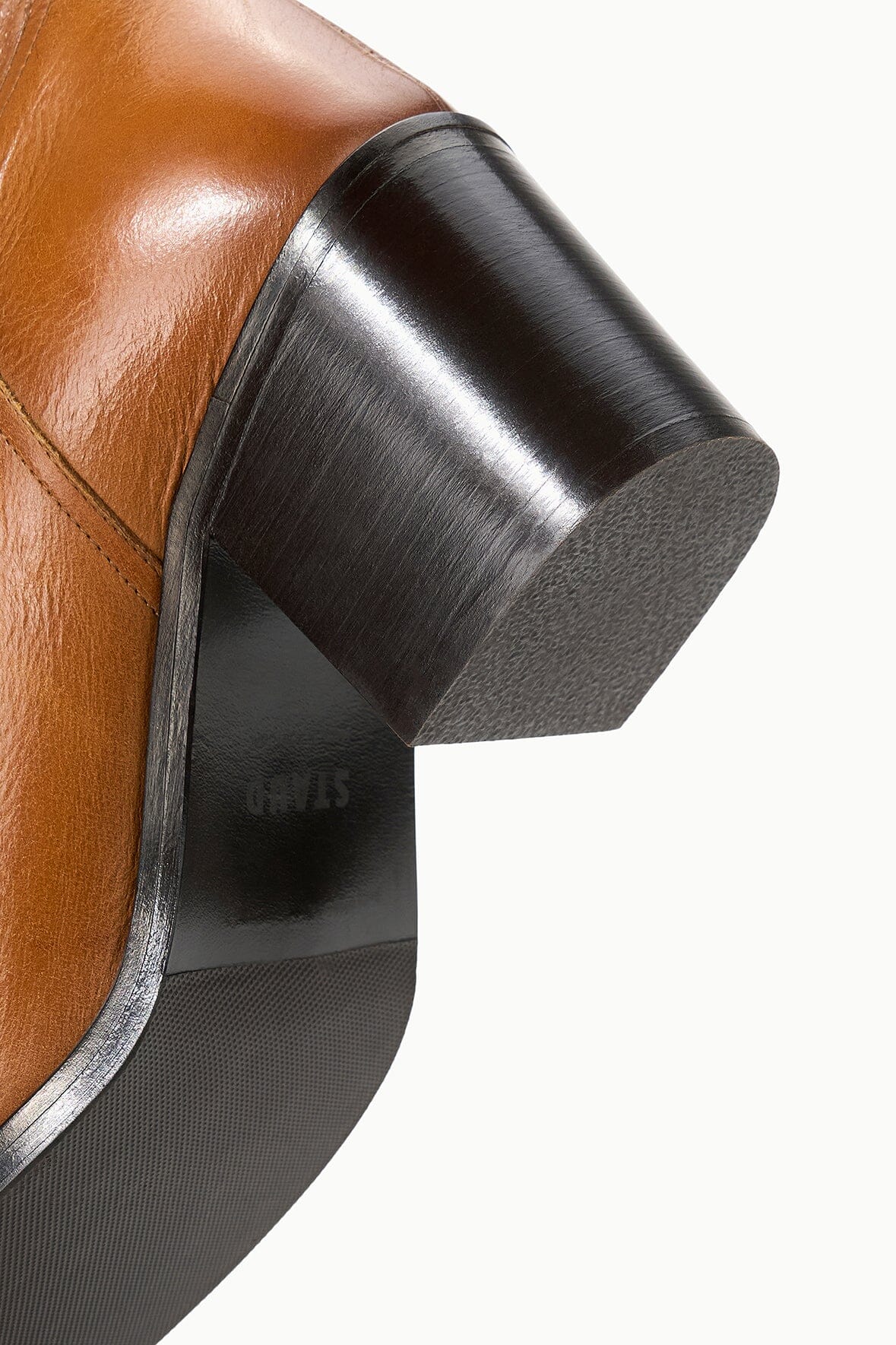 Cashew brown tall boot with black rounded block heel and side panel