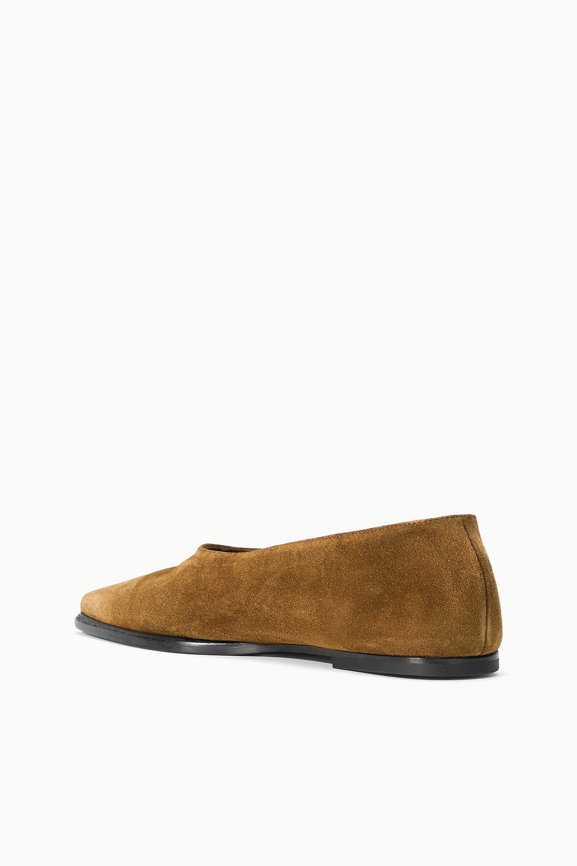 Suede flat slip-on loafers in cigar brown, angled side view