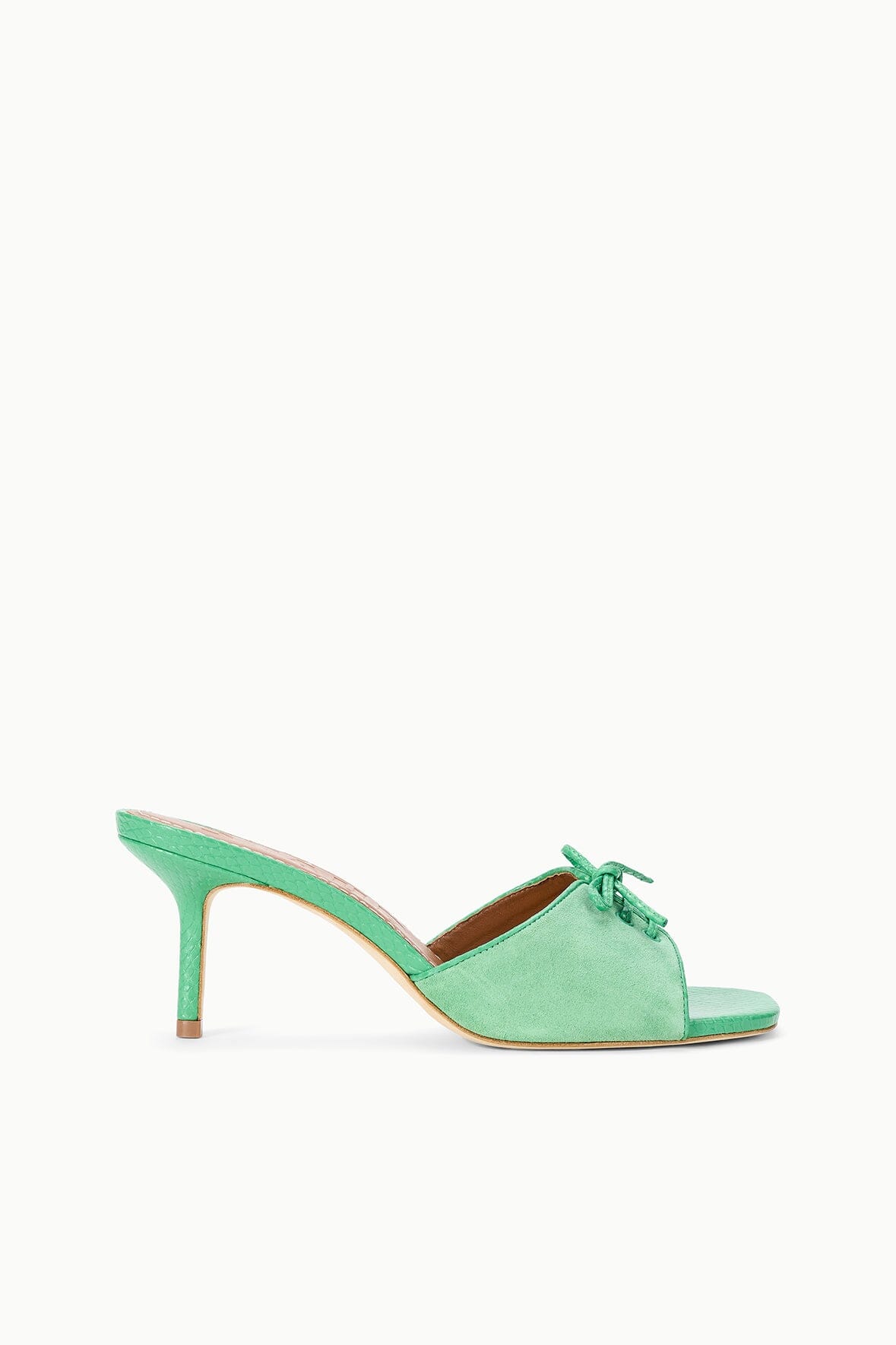 Seafoam suede mule slide with open toe, tied lace bow, and thin stiletto heel
