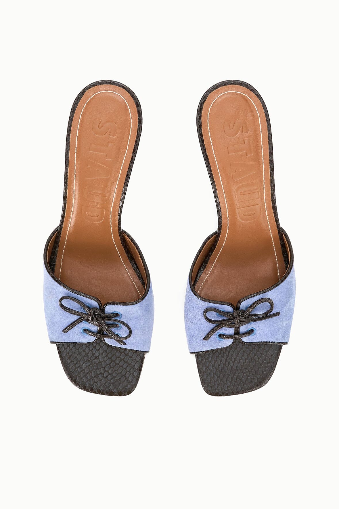 Light blue suede slide mules with lace-up detail and brown leather lining