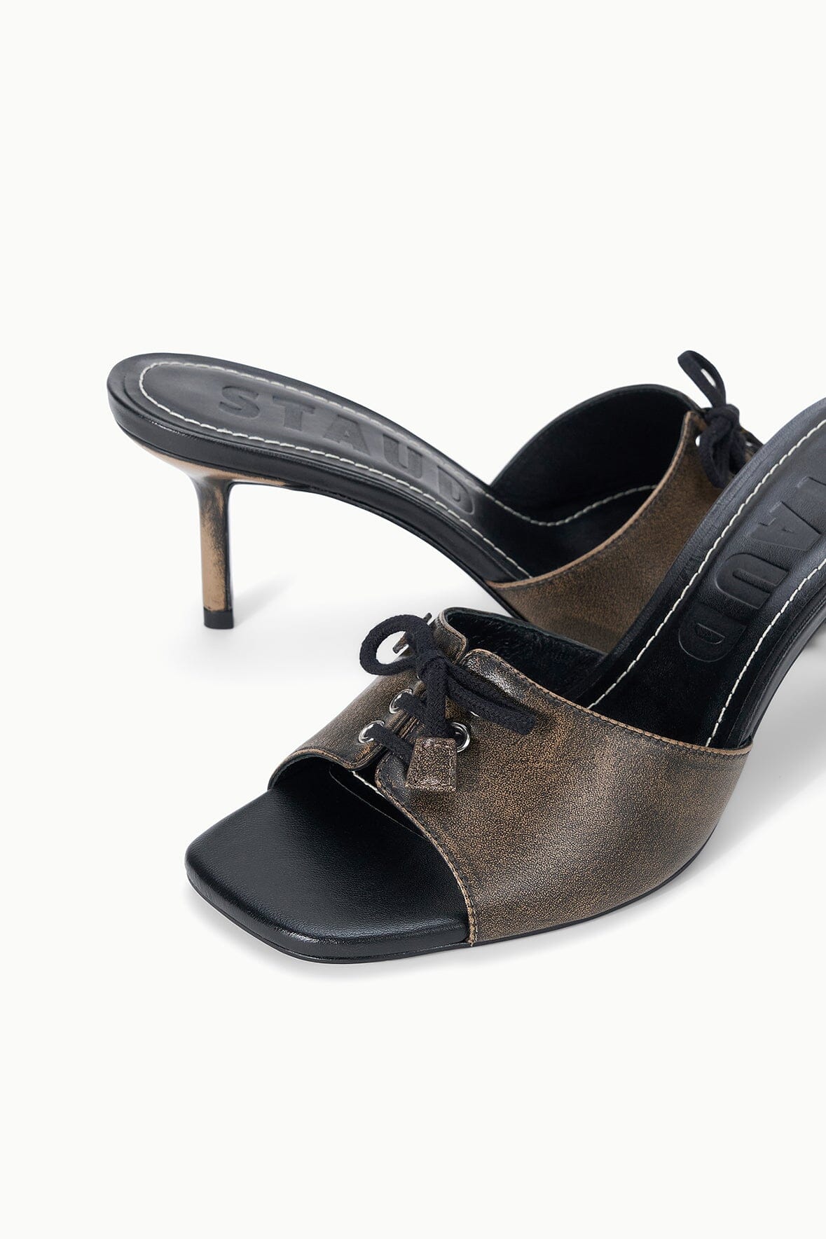 Distressed black mule sandal with lace front and open toe