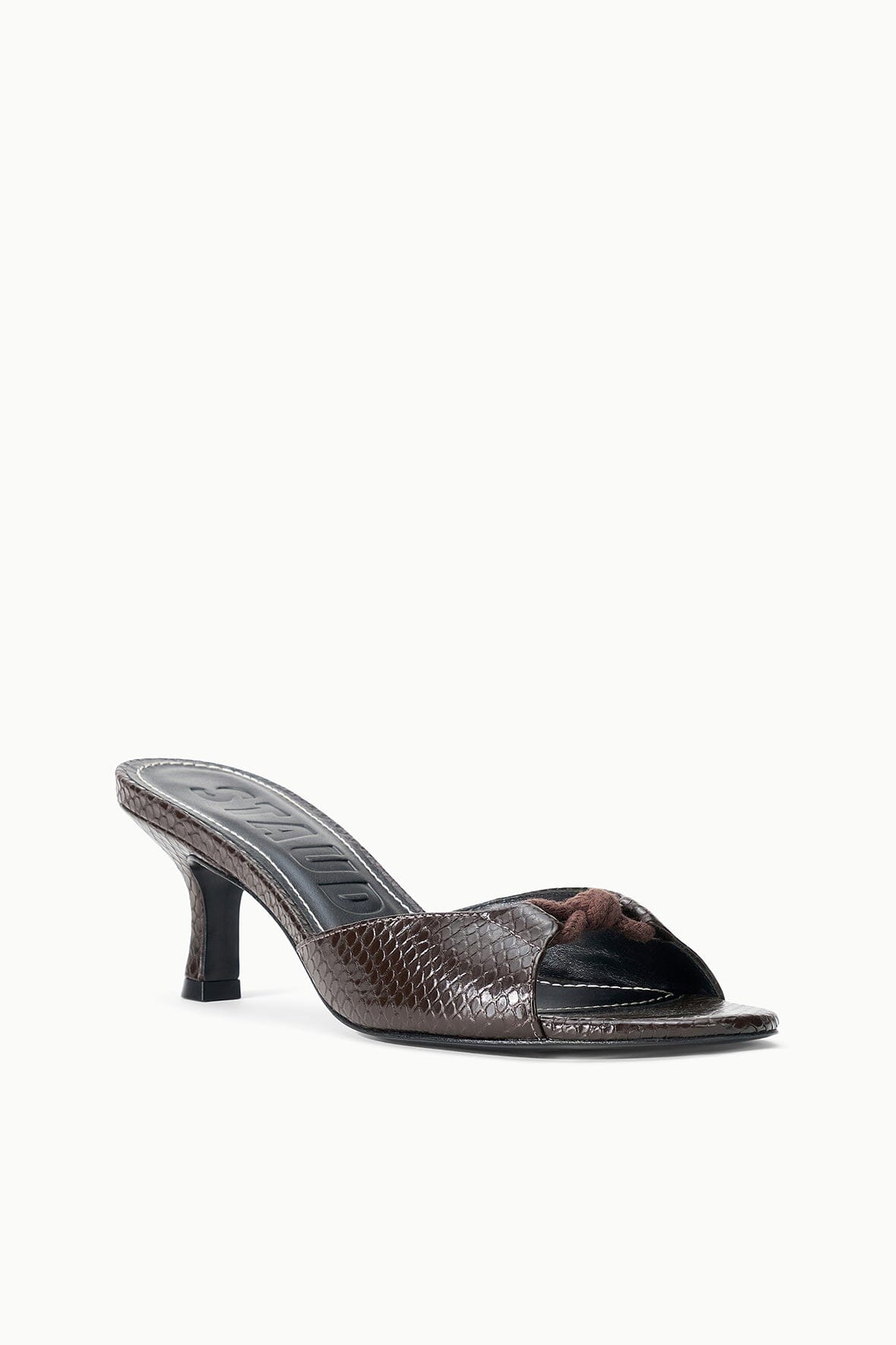 Espresso snake-print slide mule with open toe and braided knot accent