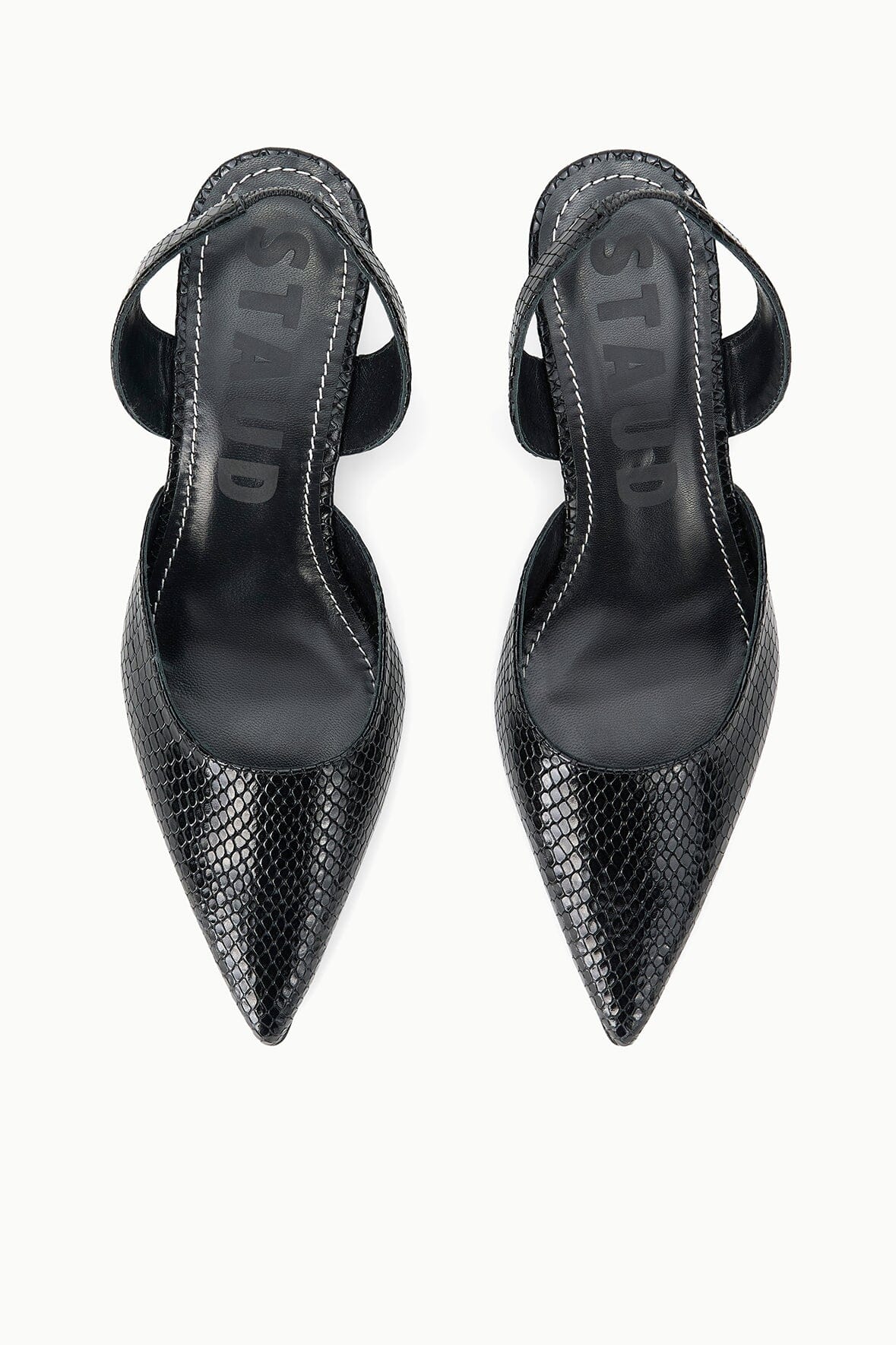 Pair of black snake-texture slingback pumps with pointed toes and thin heels