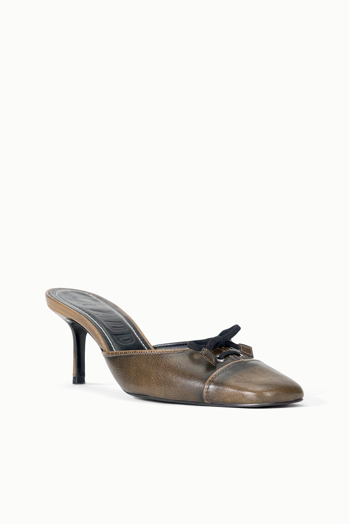 Black distressed mule with pointed toe, slim stiletto heel, and lace-up bow vamp detail