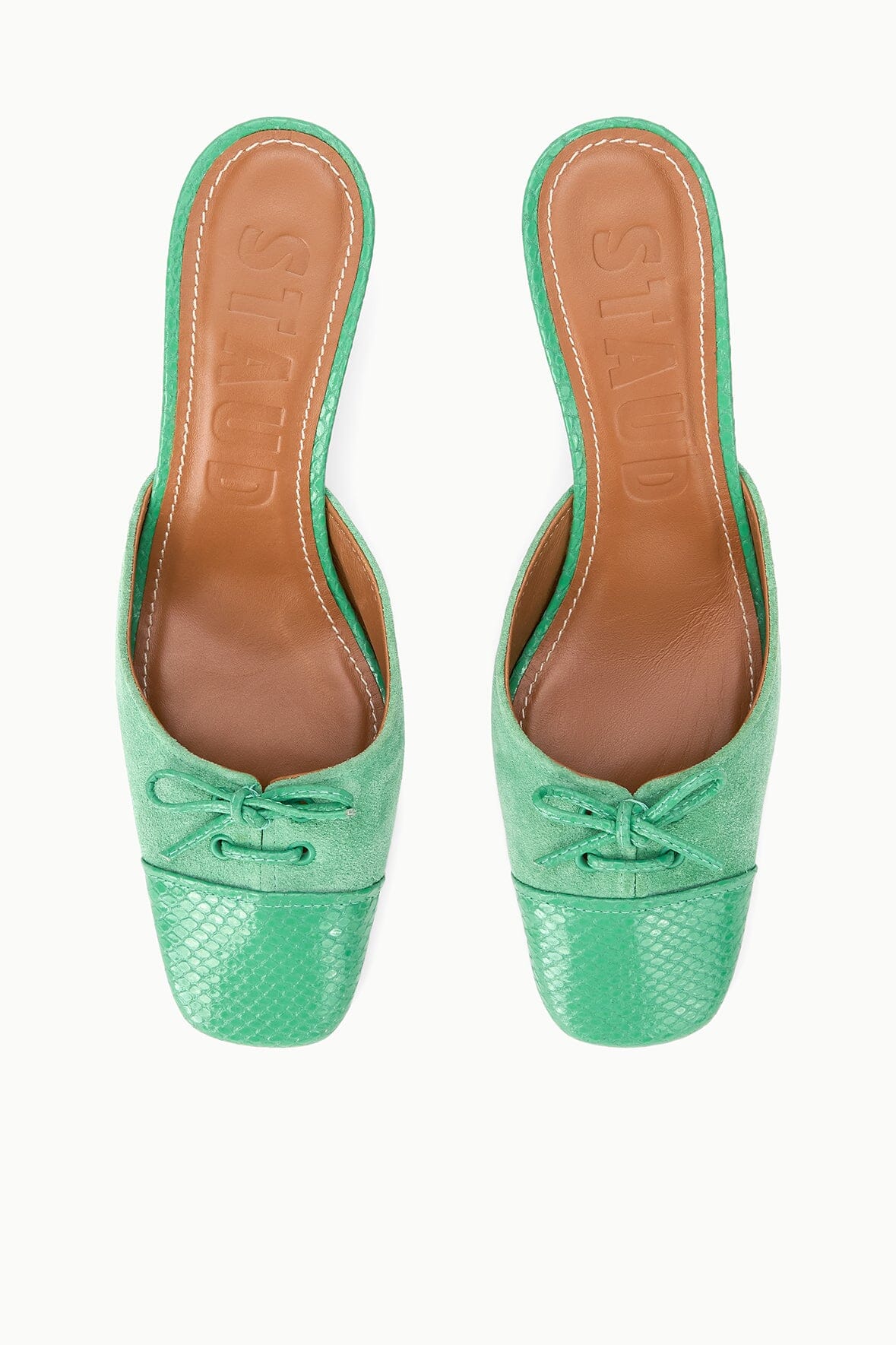 Seafoam green mule heels with pointed toe, lace-up bow front, tan insole lining