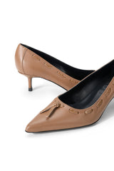 Tan leather pointed-toe kitten heel pump, featuring bow-tie accent