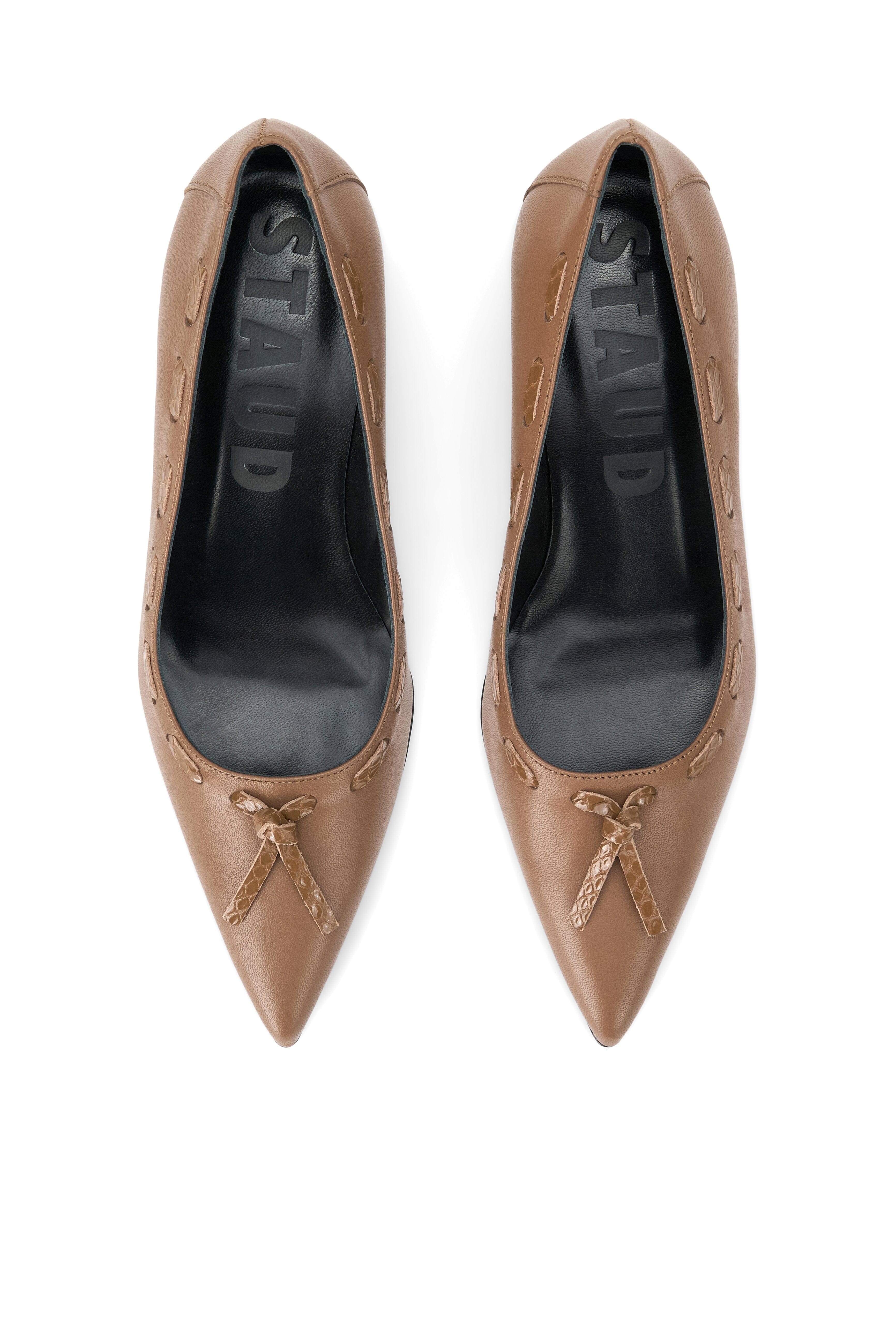 Pair of tan leather pointed-toe kitten heel pumps with bow-tie detail