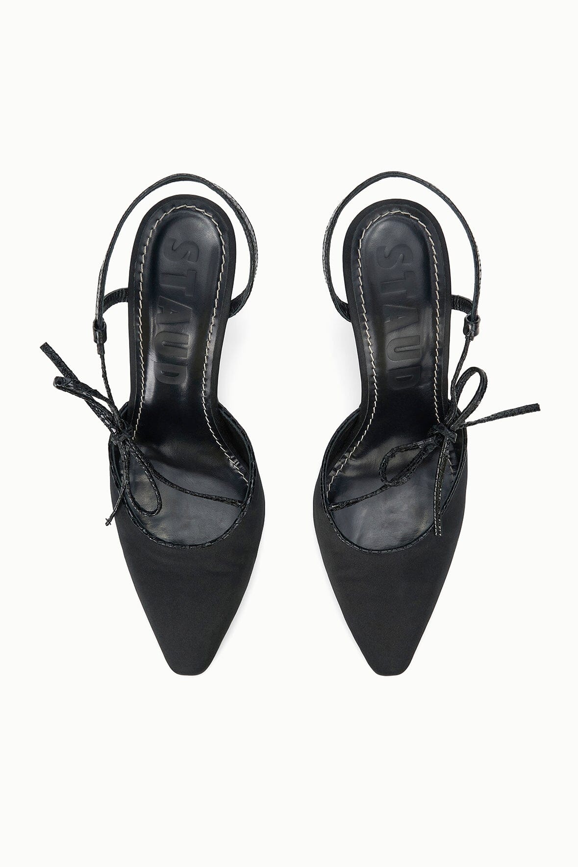 Pair of black pointed-toe heeled sandals showing insoles and tie-back ankle straps