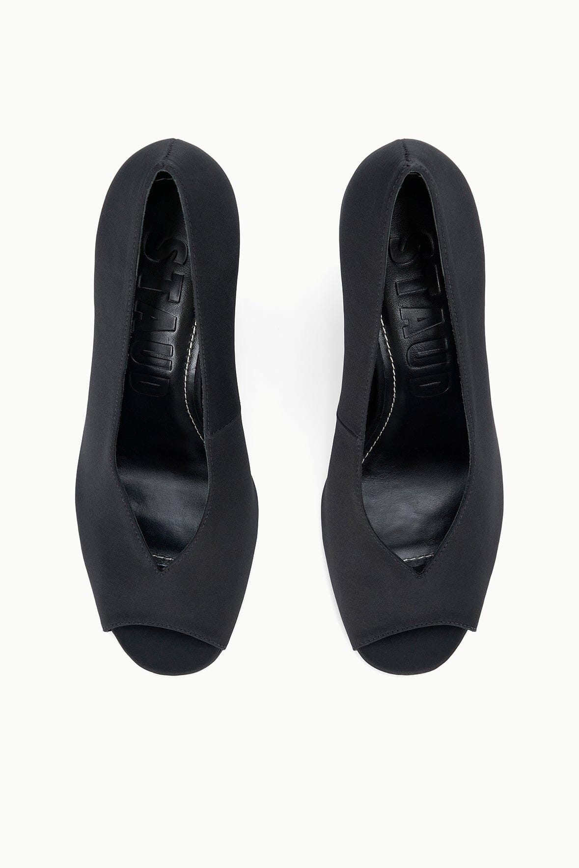 Pair of black satin peep-toe wedge heels, back view and insole detail