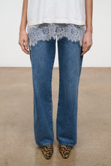 Cheetah-print ankle boots with low heel, worn with blue jeans