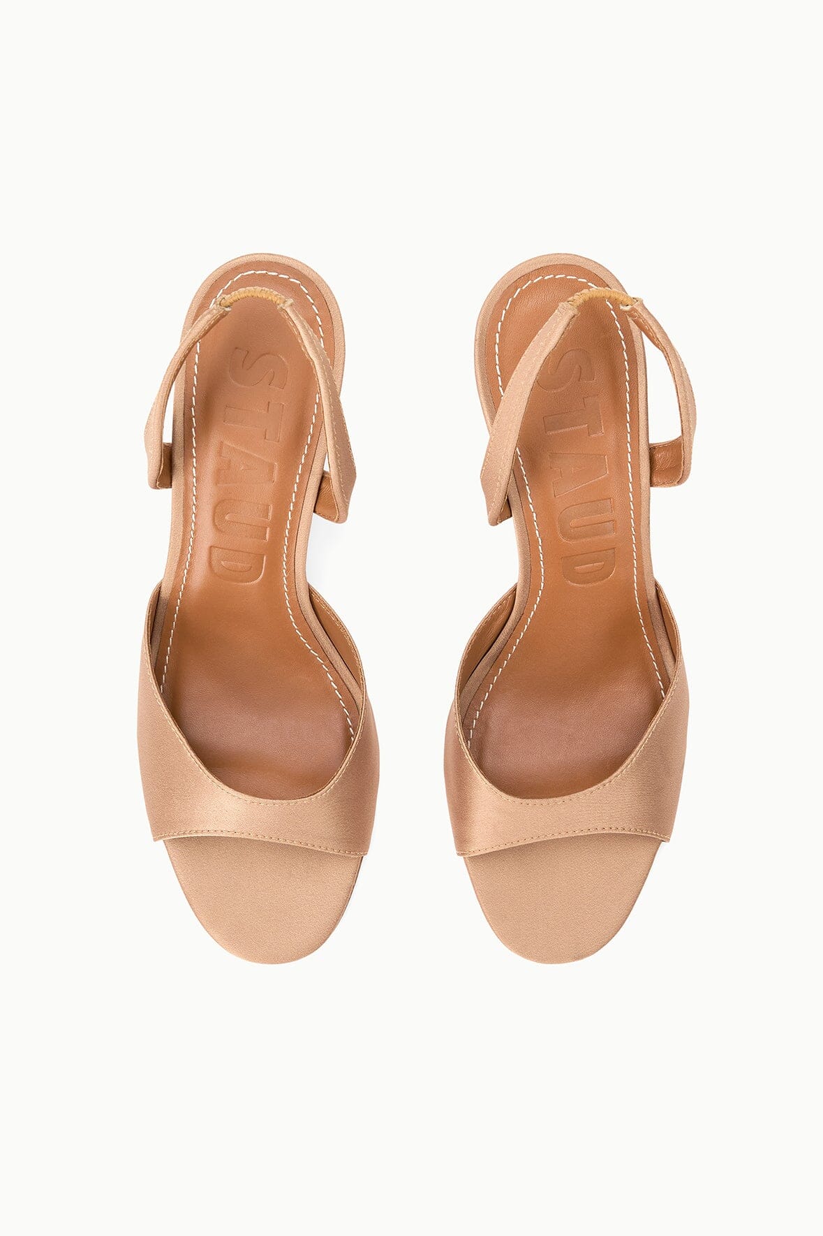 Cashew open-toe heeled sandals pair with slingback straps and low backless profile