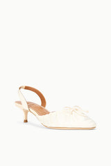 Ivory satin ballet slingback pump with angled side profile and kitten heel