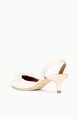 Ivory satin ballet slingback heel with open back strap and pointed toe